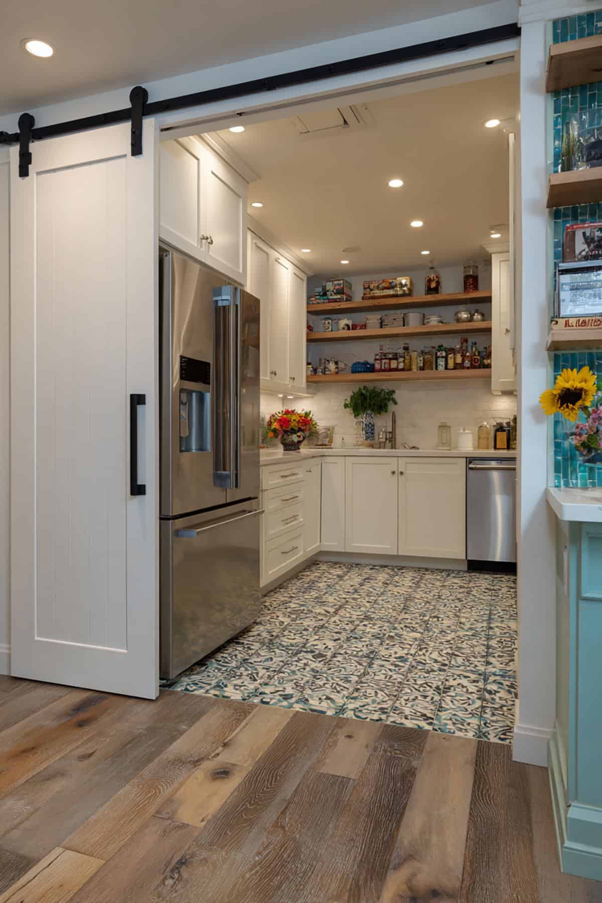 Compact L Shaped Kitchen With Sliding Barn Door Pantry