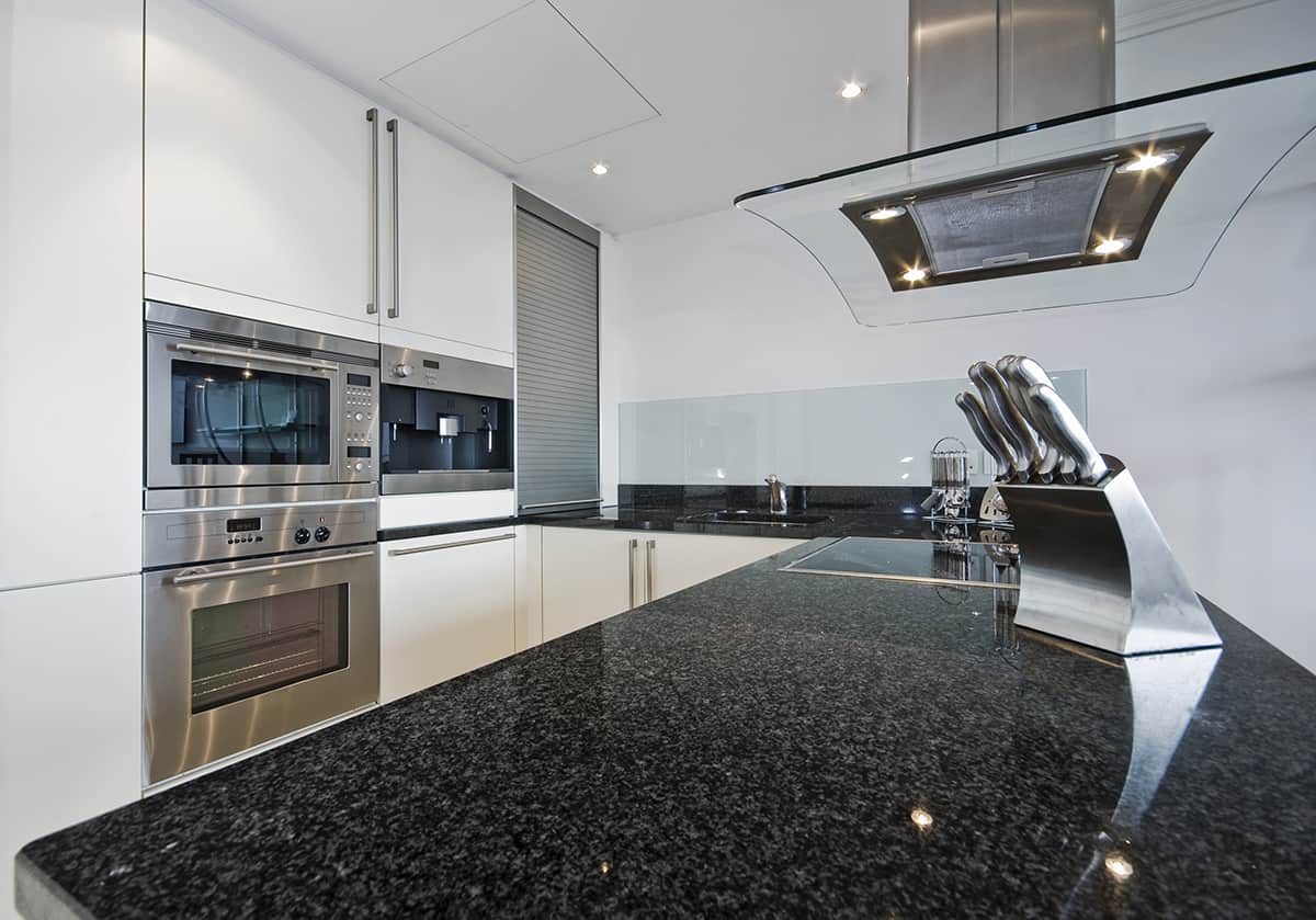 Granite Black Countertops and White Cabinets