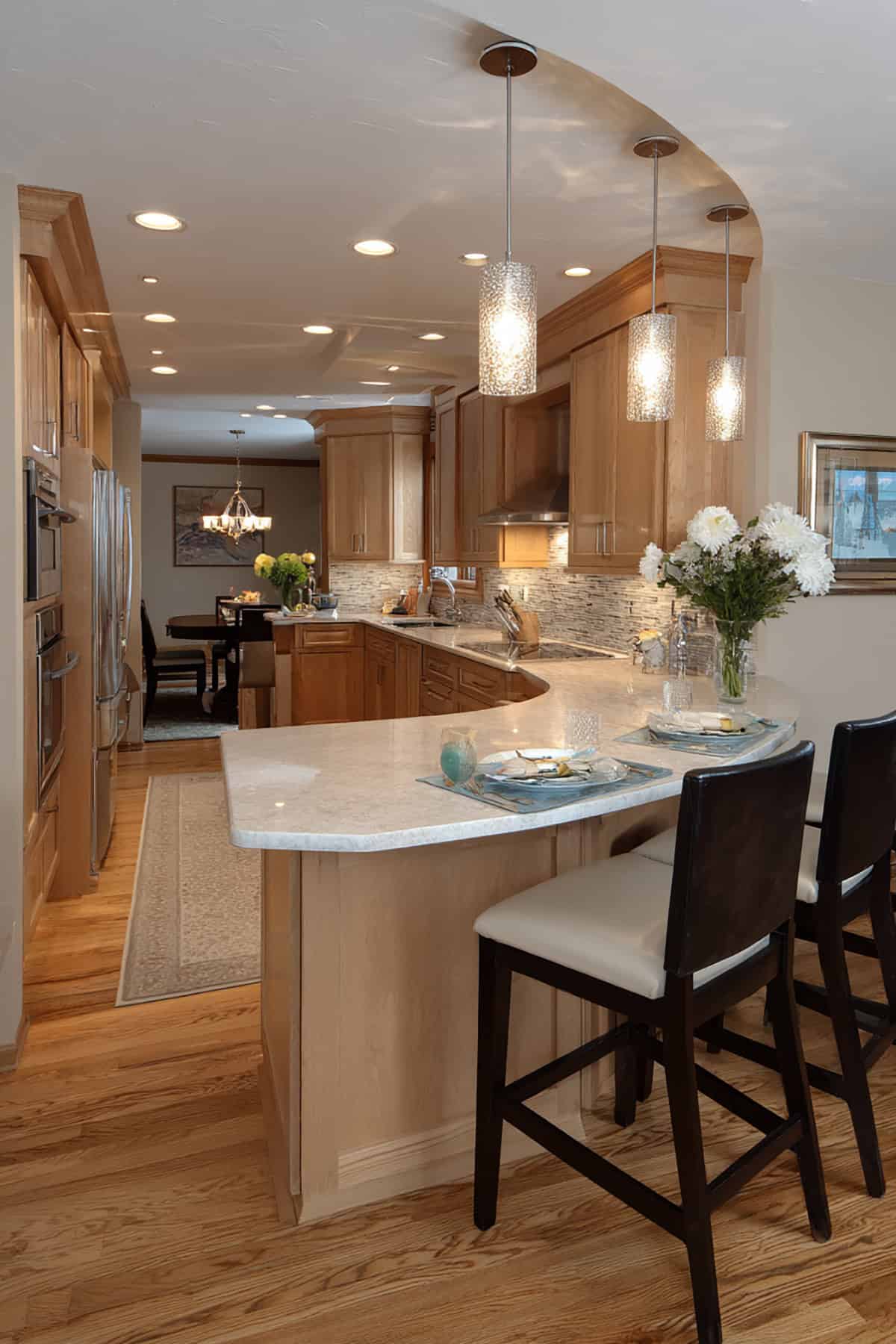L Shaped Kitchen With Curved Peninsula Bar