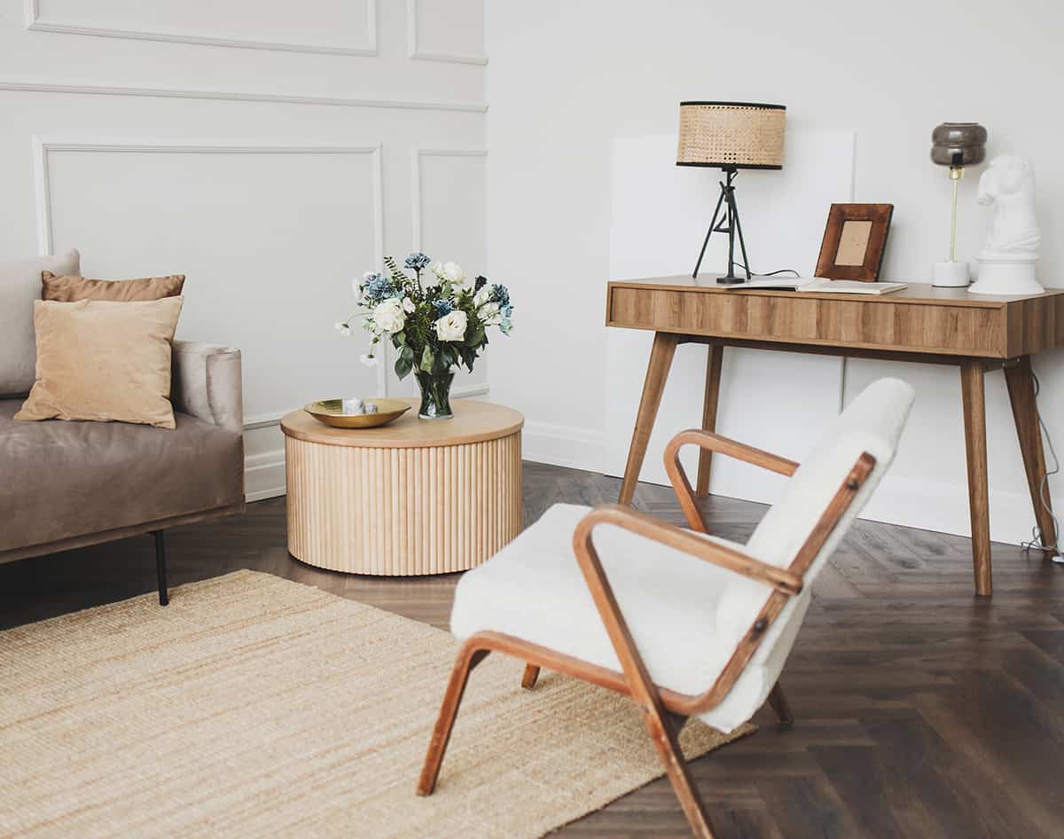 Beige Rug and Dark Wooden Floors