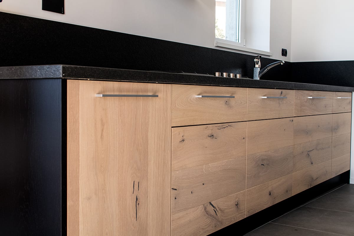 Black Floors and Oak Cabinets