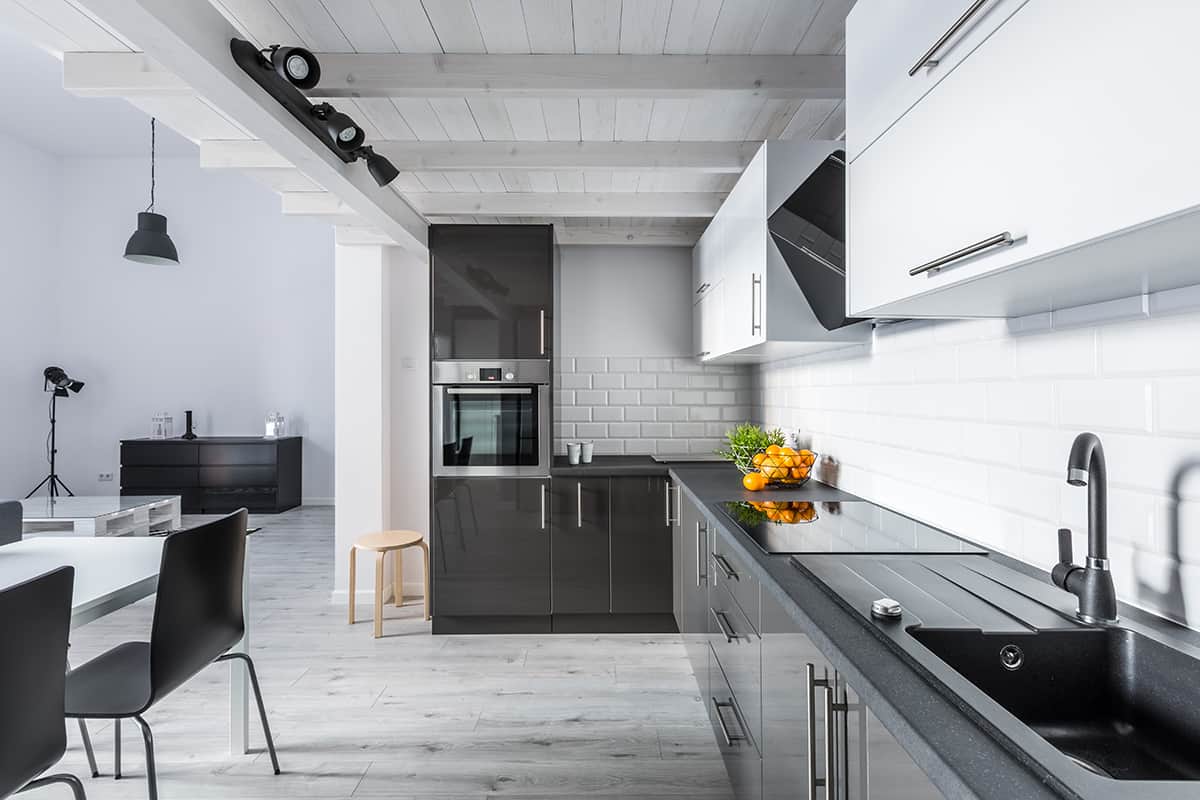 Black Kitchen Cabinets and Gray Floors