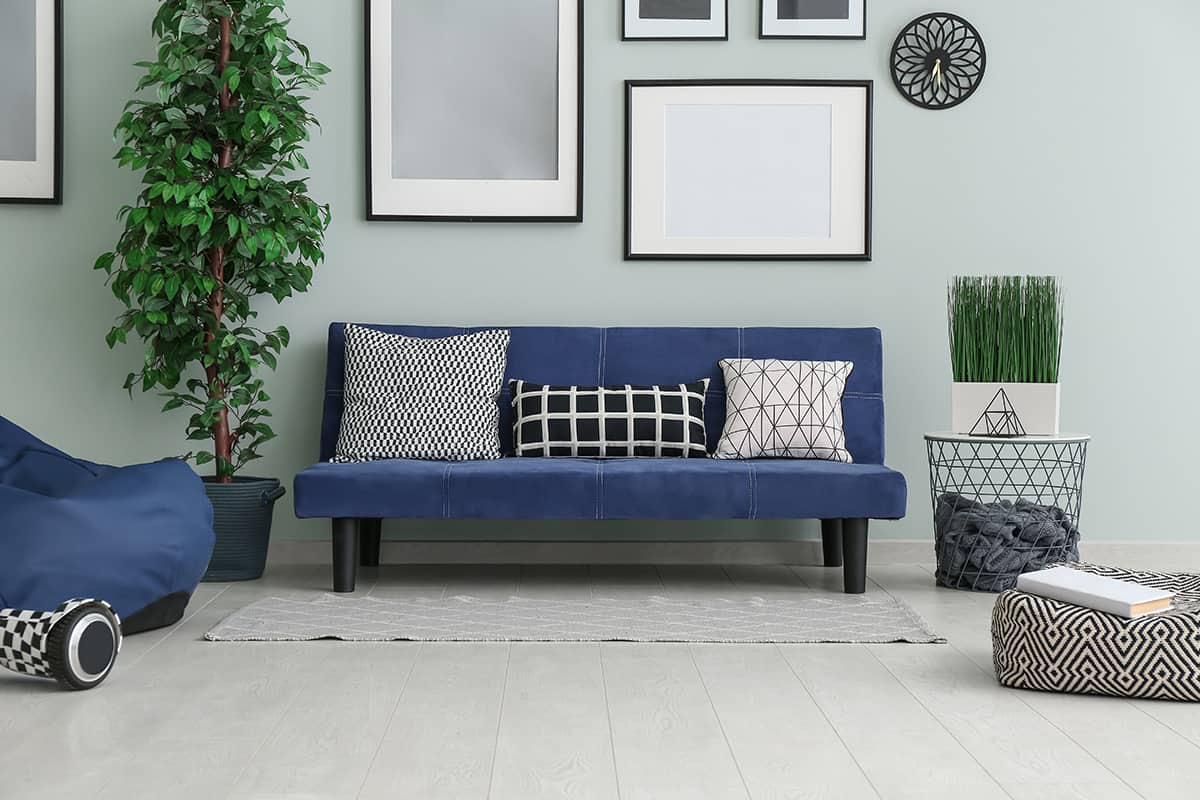 Blue Couch and Grey Walls