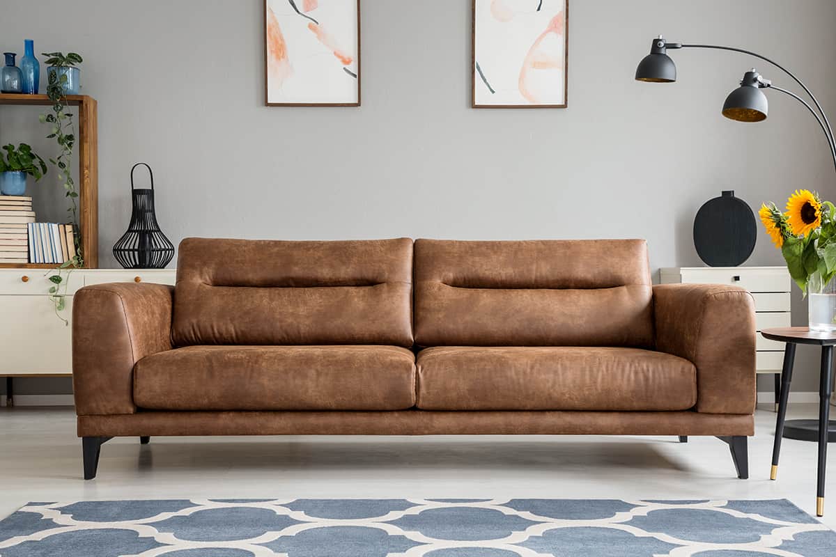 Brown Couch and Grey Walls