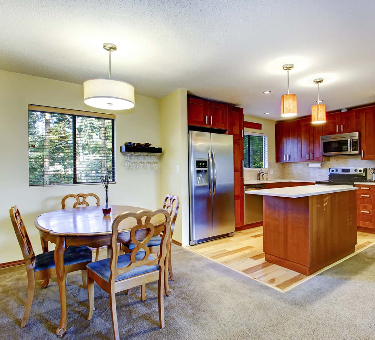 Gray Tile Floors and Cherry Cabinets