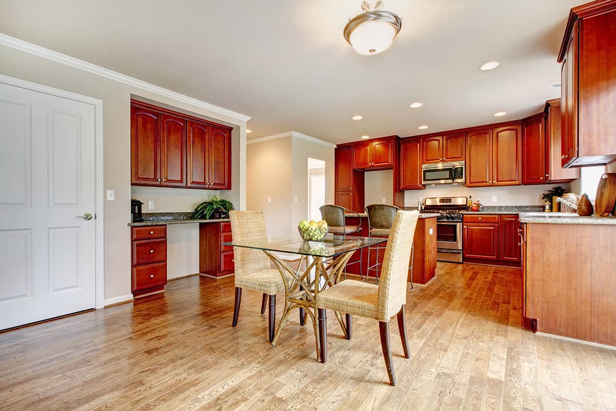 Gray Wood Floors and Cherry Cabinets