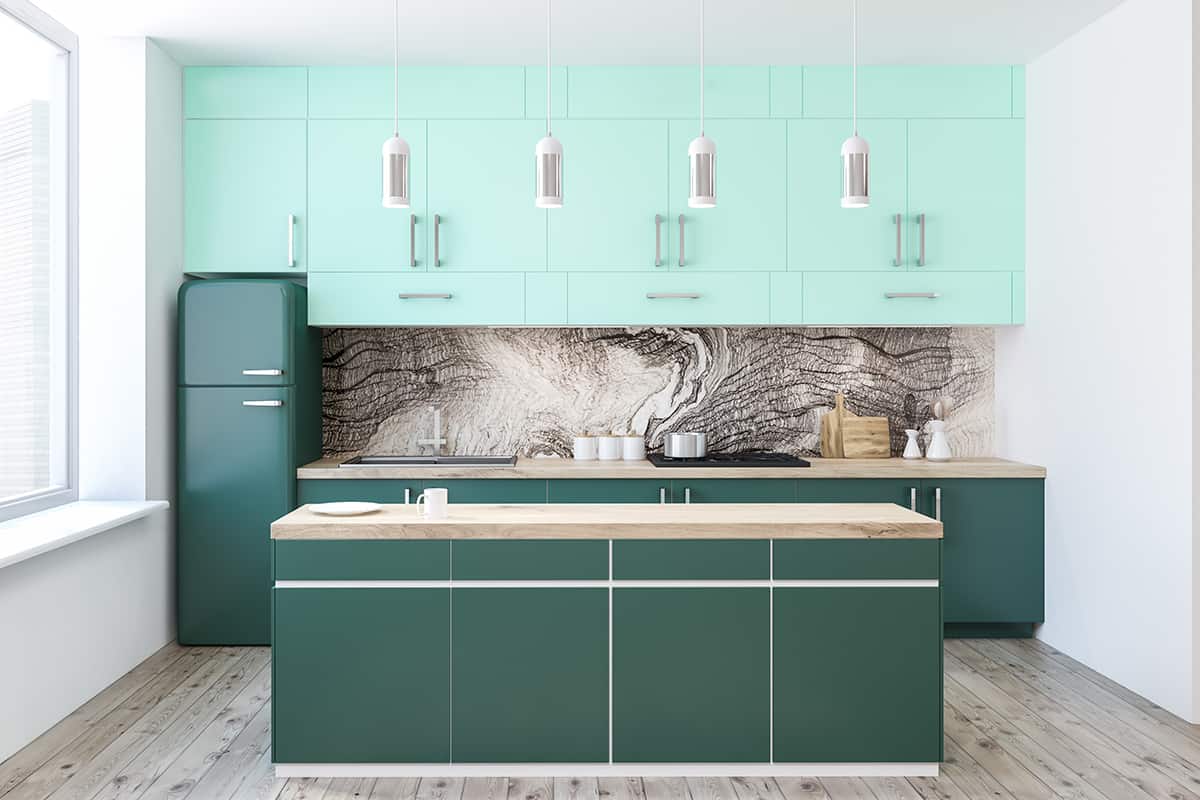 Green Kitchen Cabinets and Gray Floors