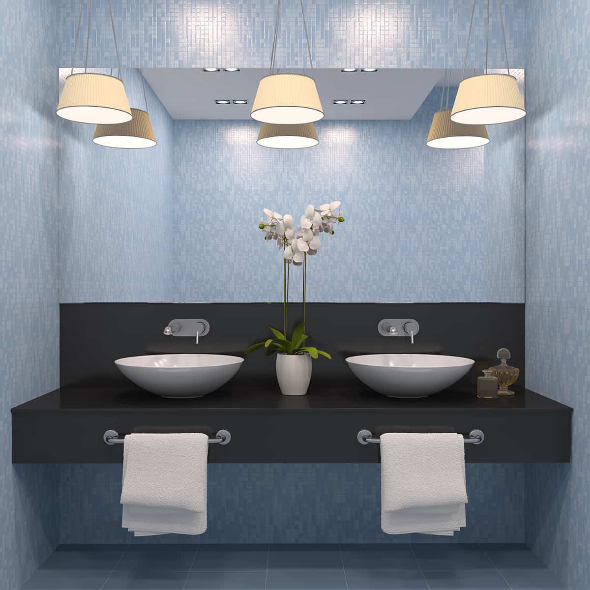 Light blue walls with dark gray bathroom cabinets