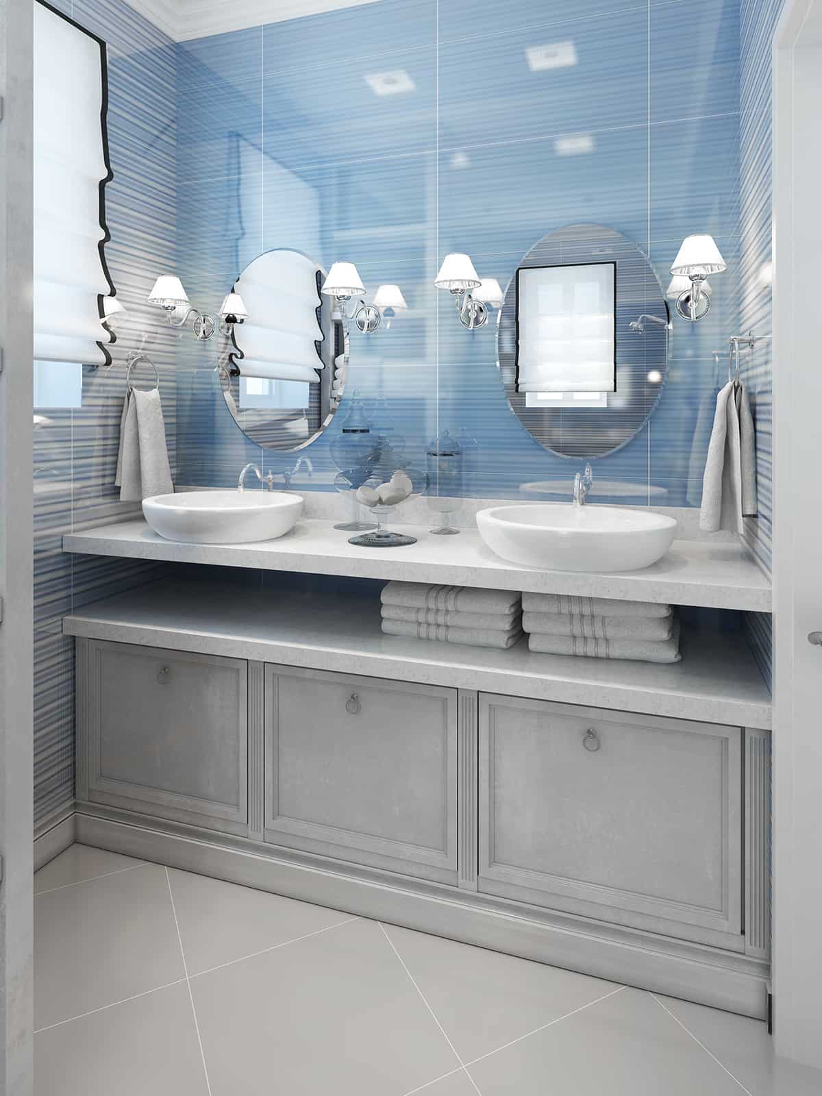Light Blue Walls and Light Gray Bathroom Cabinets