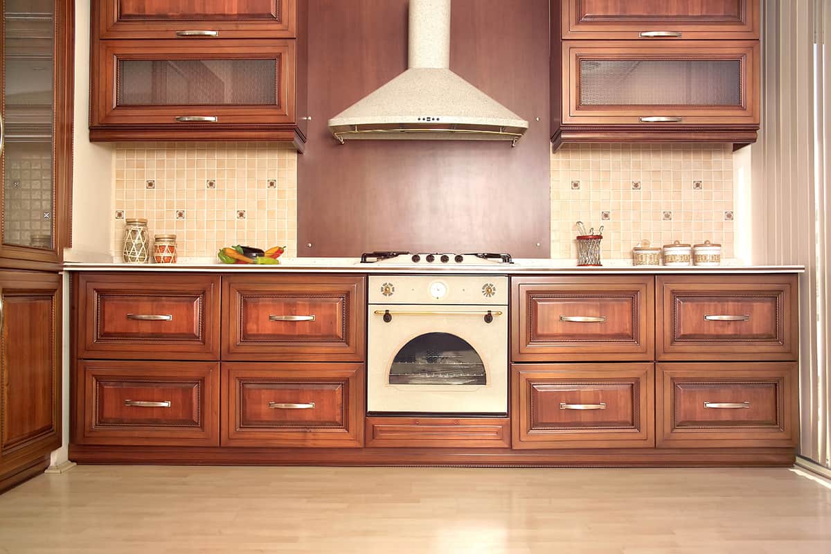 Light & White Floors and Cherry Cabinets