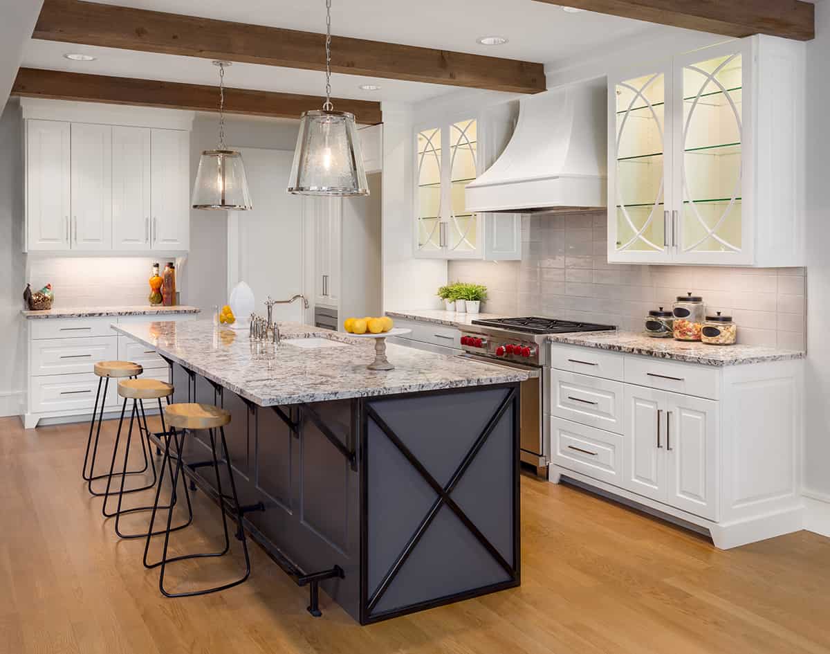 Medium Wood Floors and White Cabinets