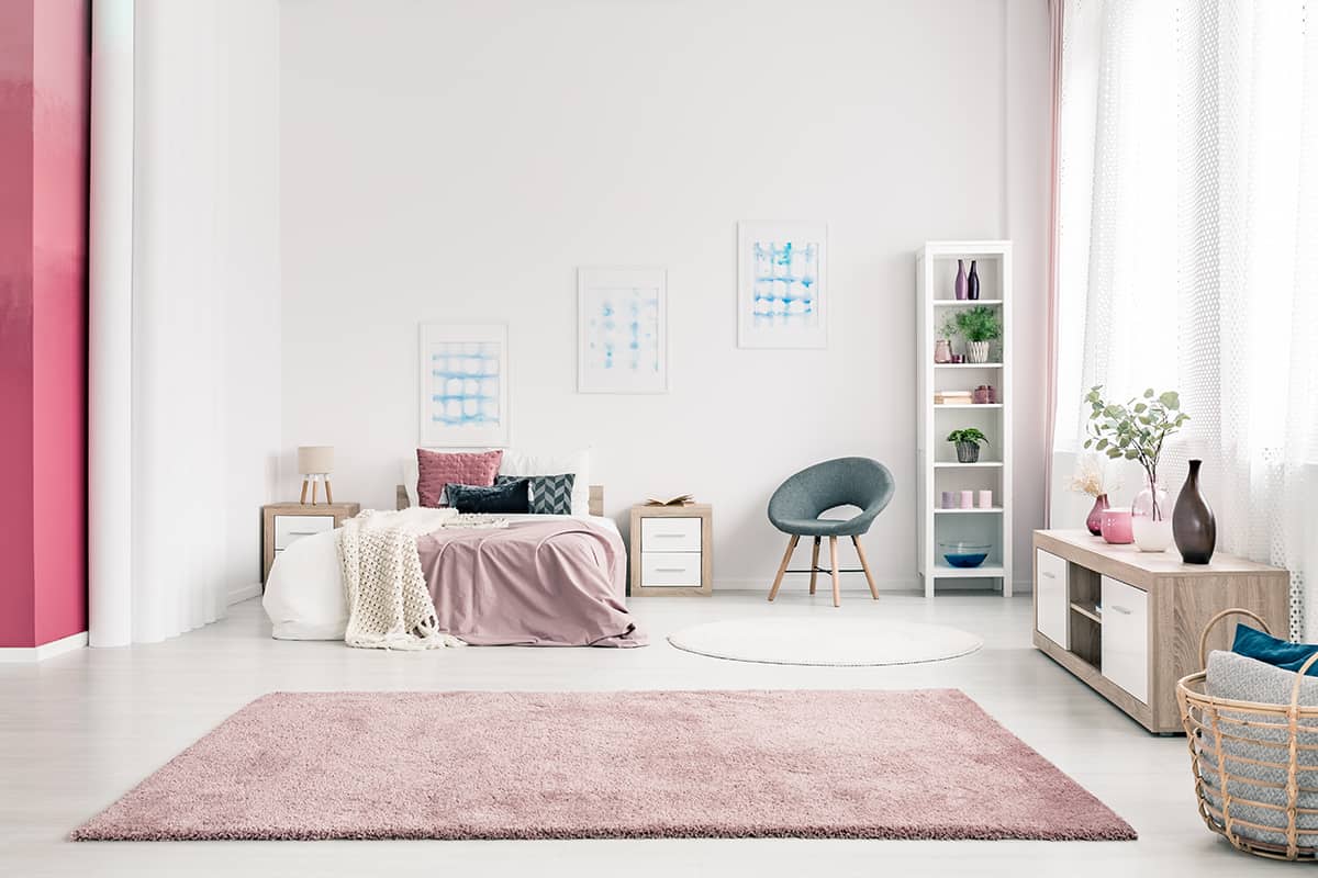 Pink Rug and Grey Flooring