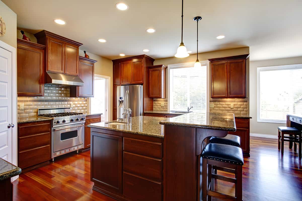 Red Floors and Oak Cabinets