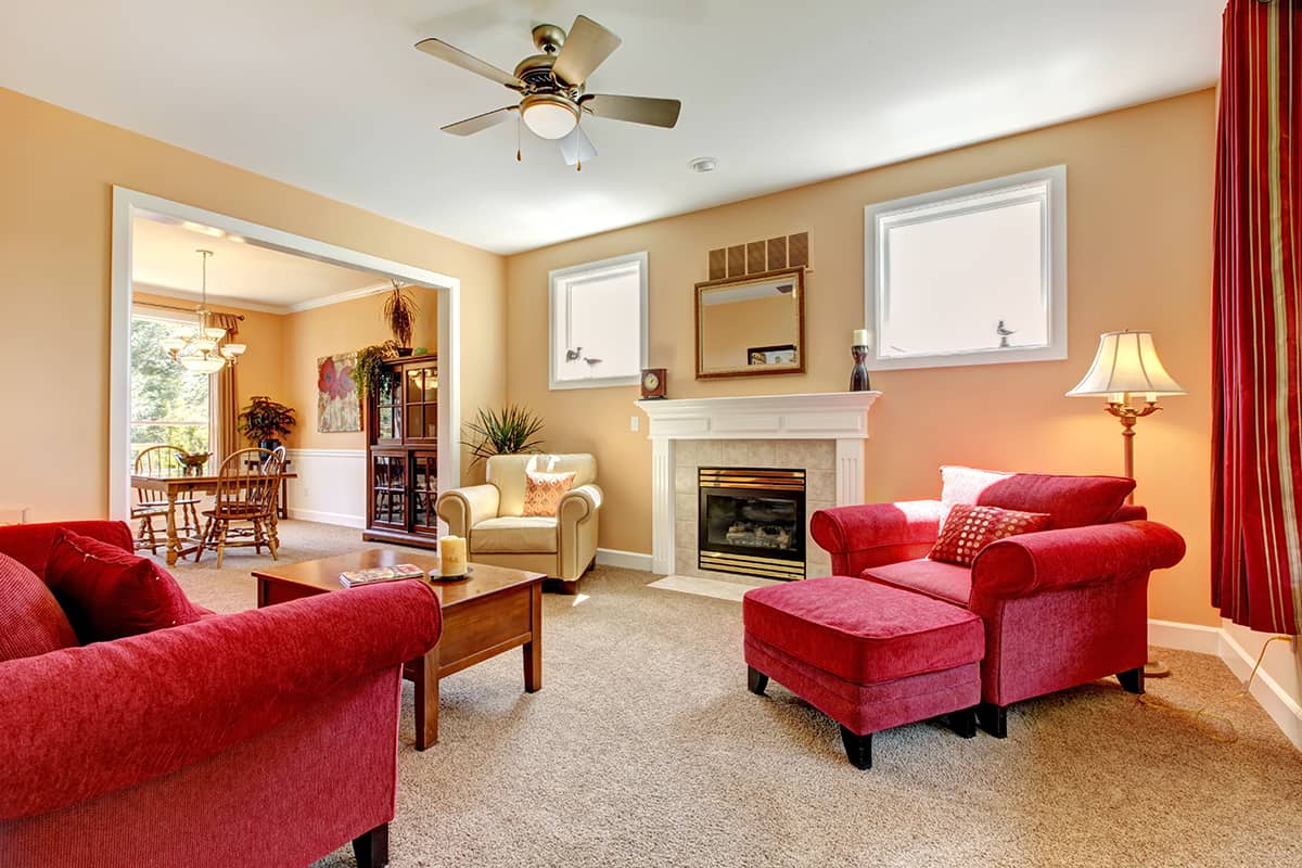 Red Furniture and Brown Walls