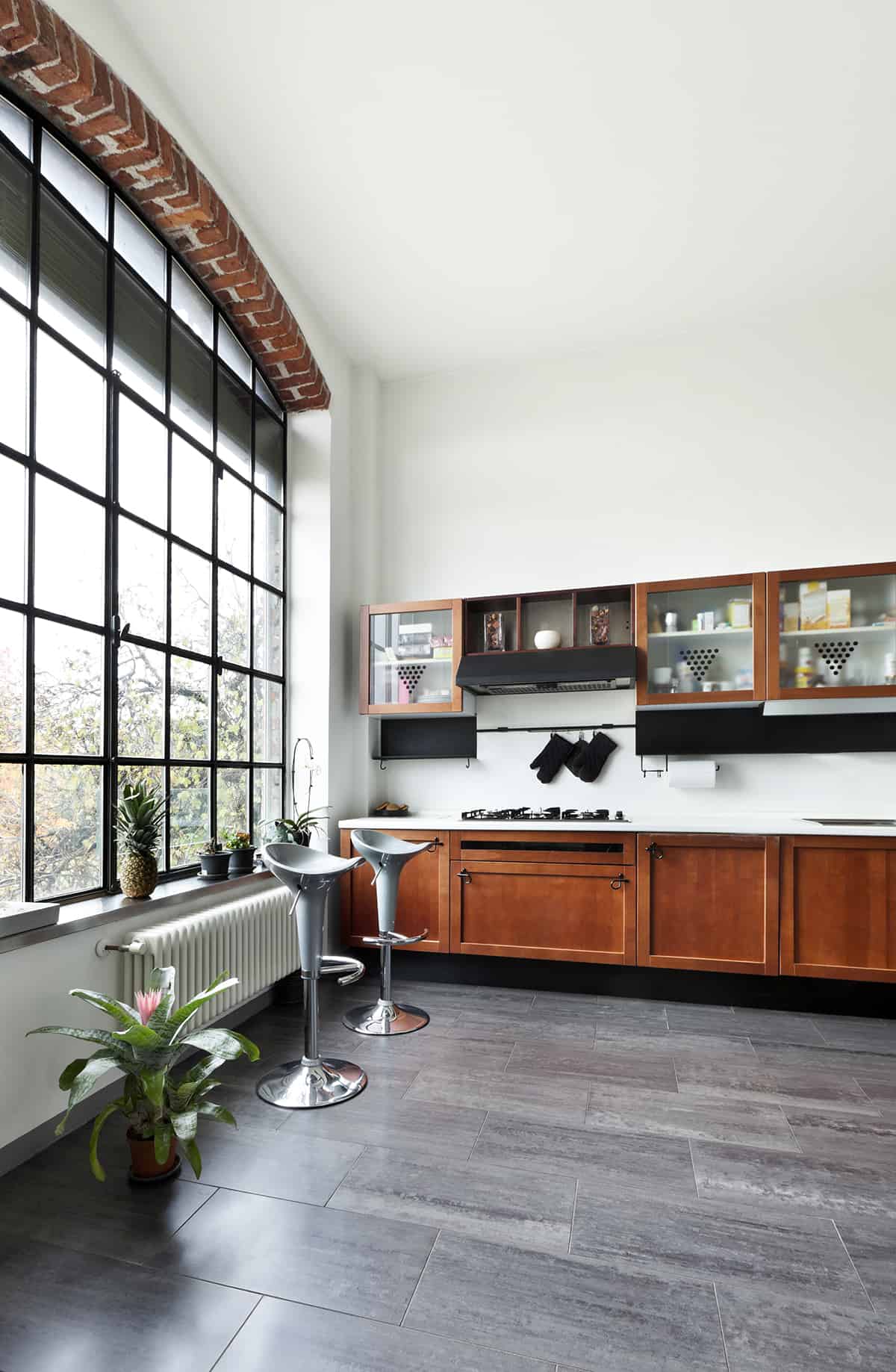 Red Kitchen Cabinets and Grey Floors