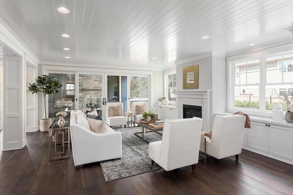 White and Grey Rug and Dark Wooden Floors