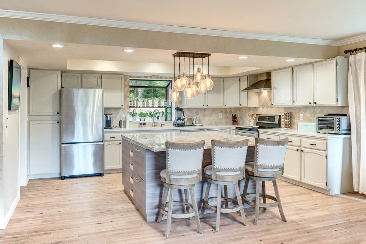 White Floors and oak cabinets