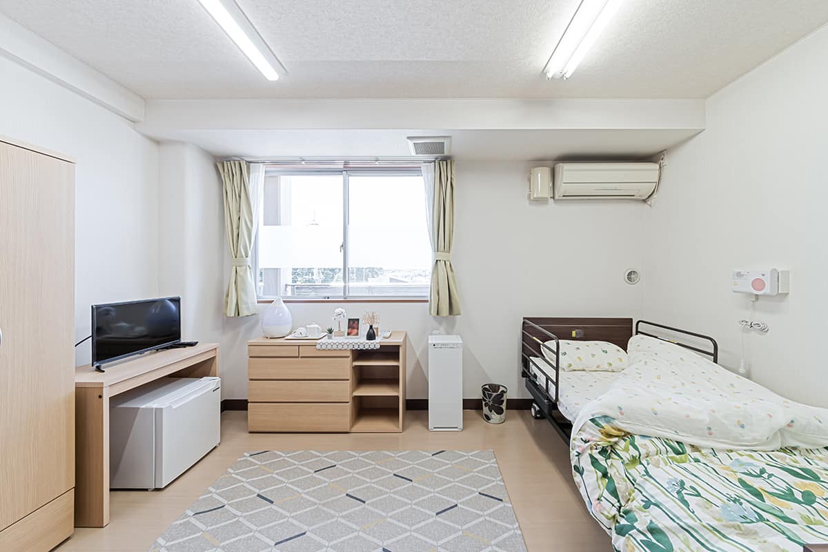 Care Facility Bedroom with a Desk