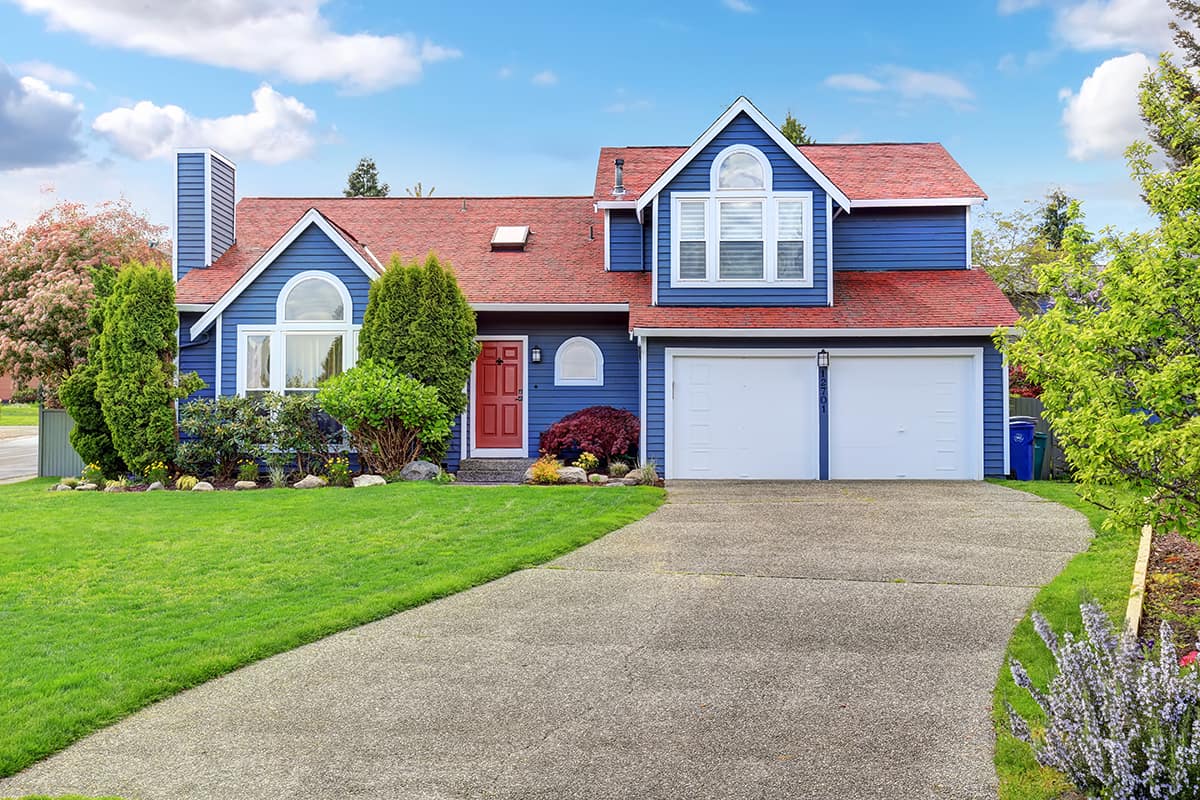 Rich Blue Siding with Red Shingles