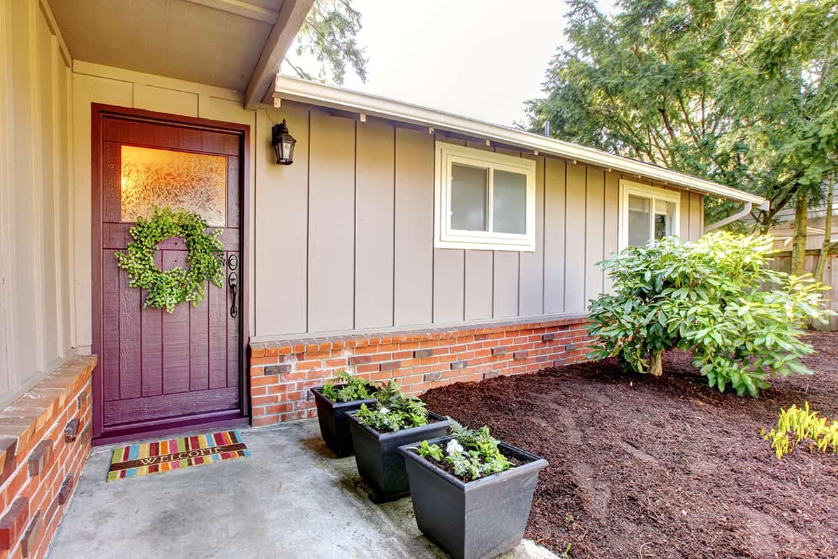 Red Door on Brick and Gray Exterior