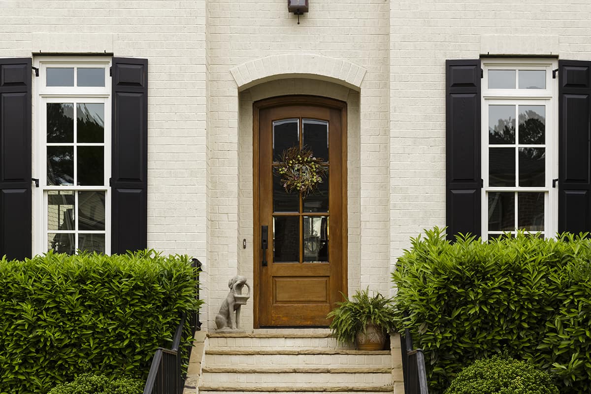 Accent the White Brick with a Wooden Front Door