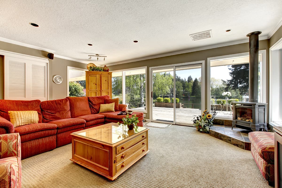 Bright Living Room with Corner Stove