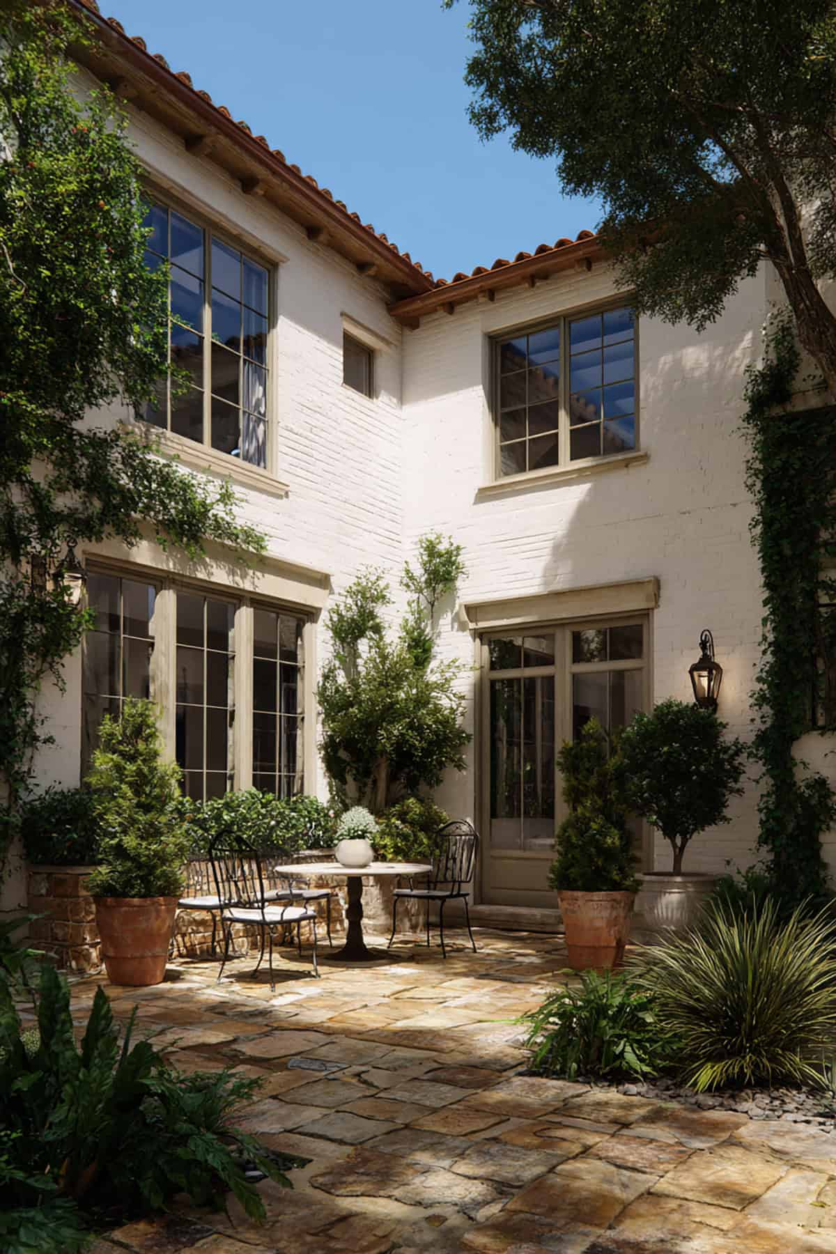 Courtyard Patio With White Painted Brick Walls