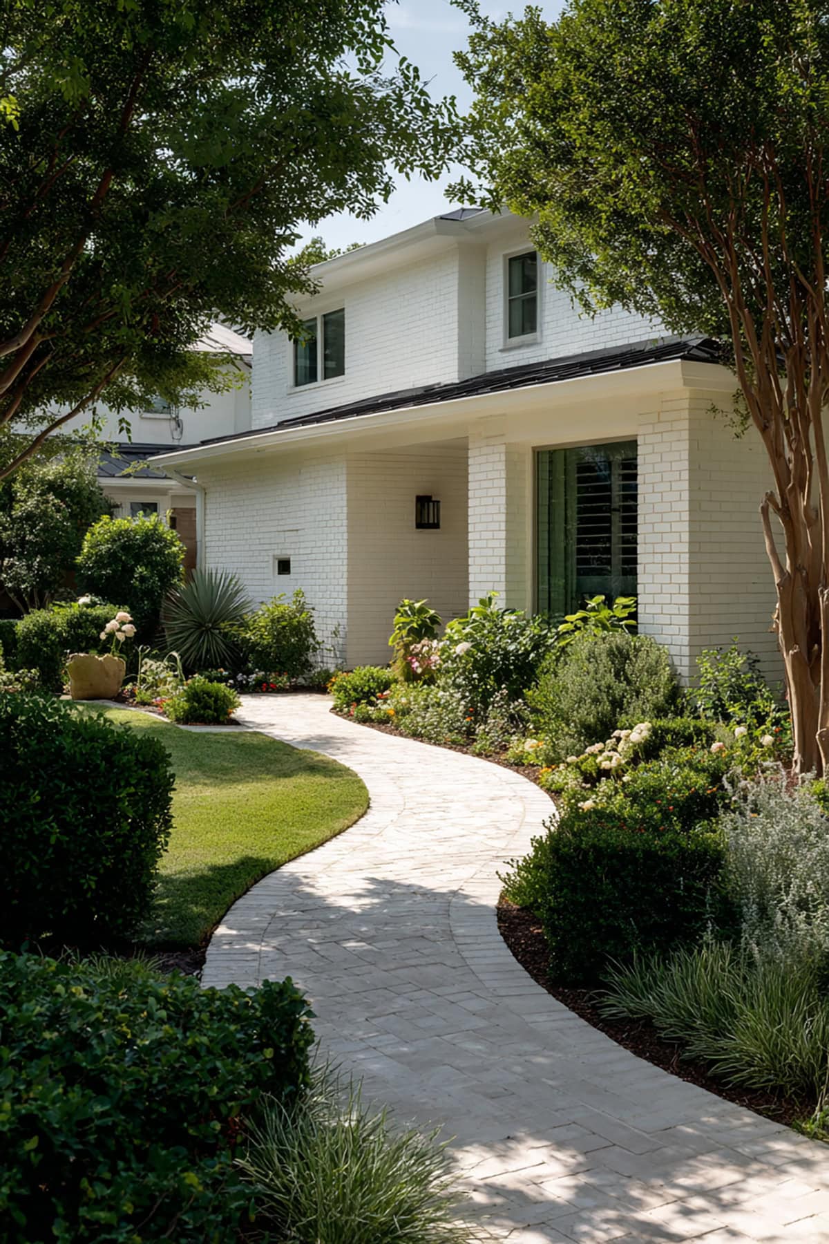 White Brick Exterior with Curved Walkway