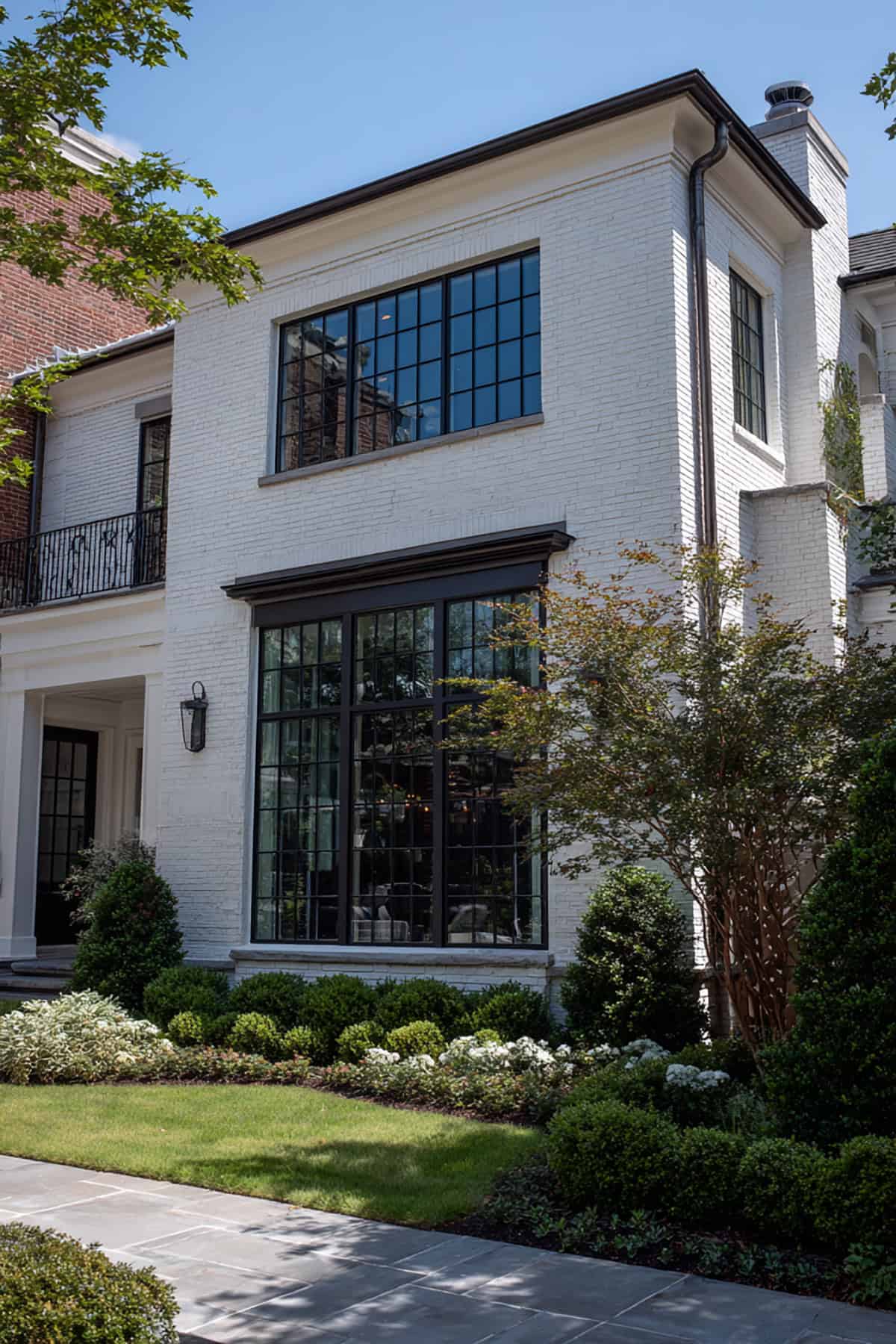 White Brick House with Dark Window