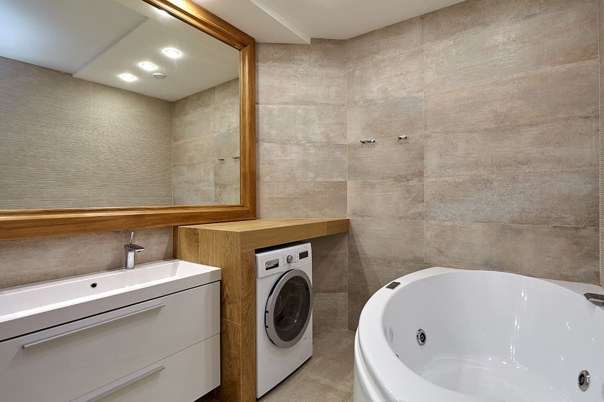 Sleek Jacuzzi Bathroom with Laundry Space