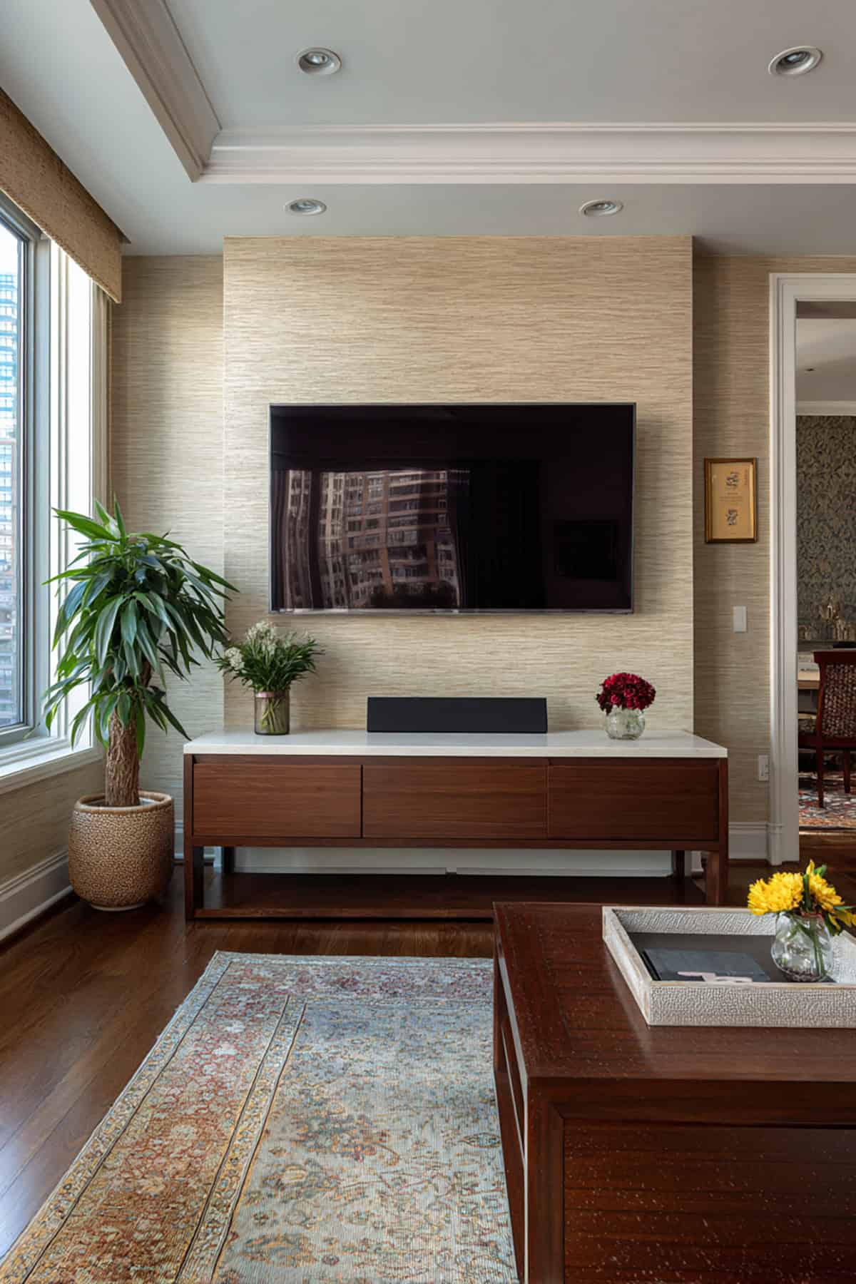Add A Textured Wallpaper Panel Above The TV