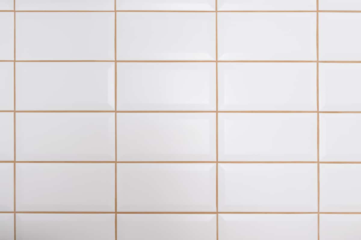 White Tile and Light Brown Grout