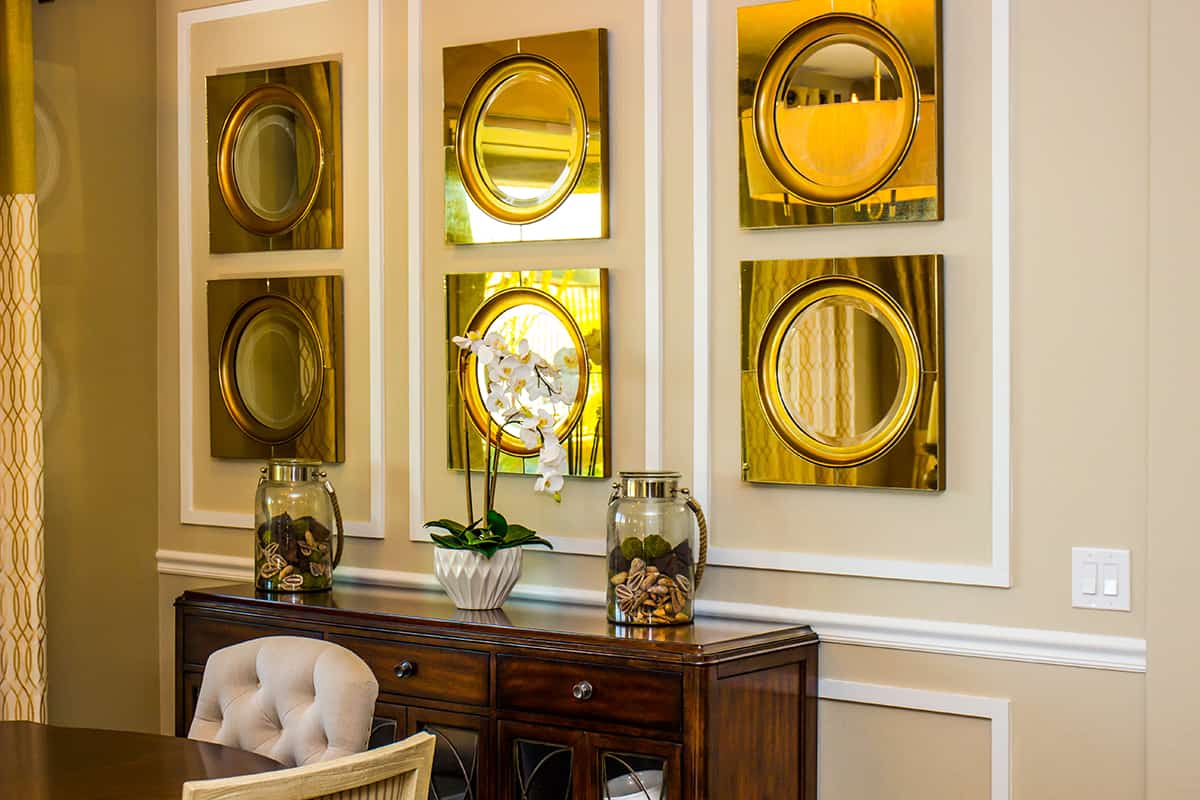 Hang a Series of Mirrors on the Same Wall