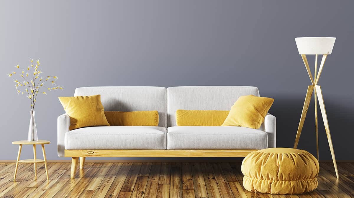 Yellow Ottomans with a Gray Couch
