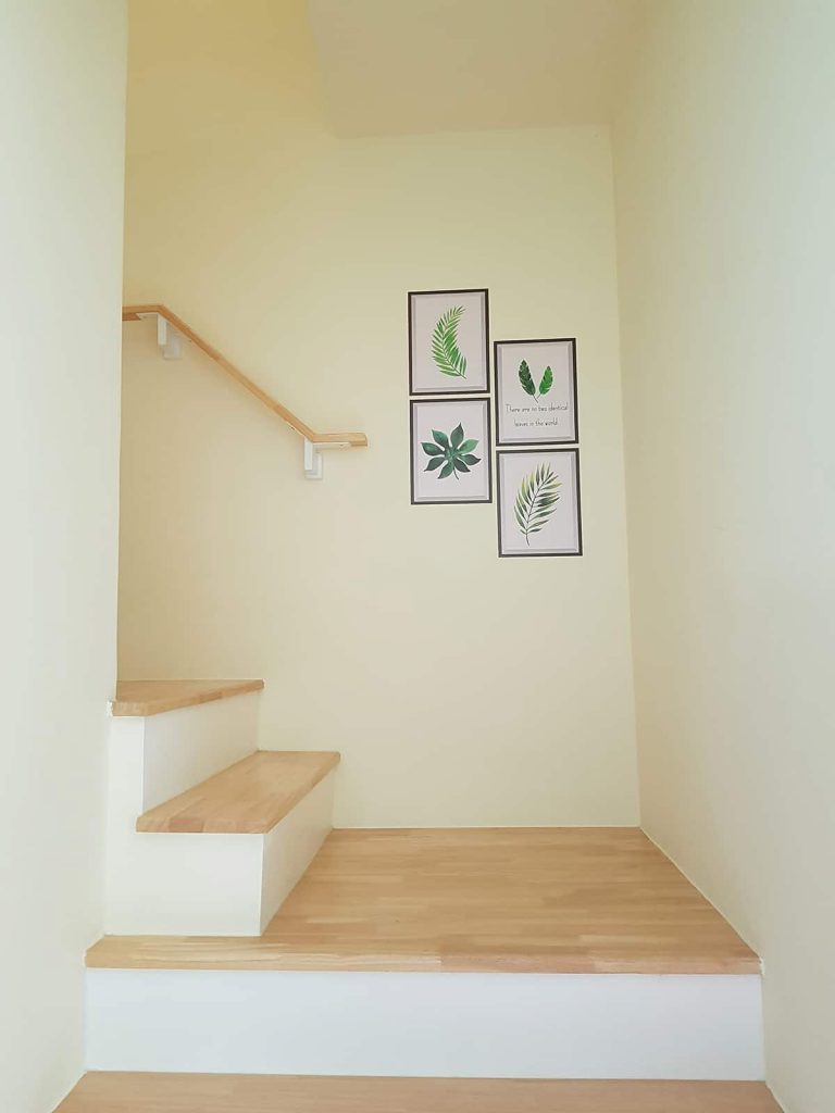 How to Hang Pictures on a Staircase Wall [5 Arrangement Ideas] Homenish