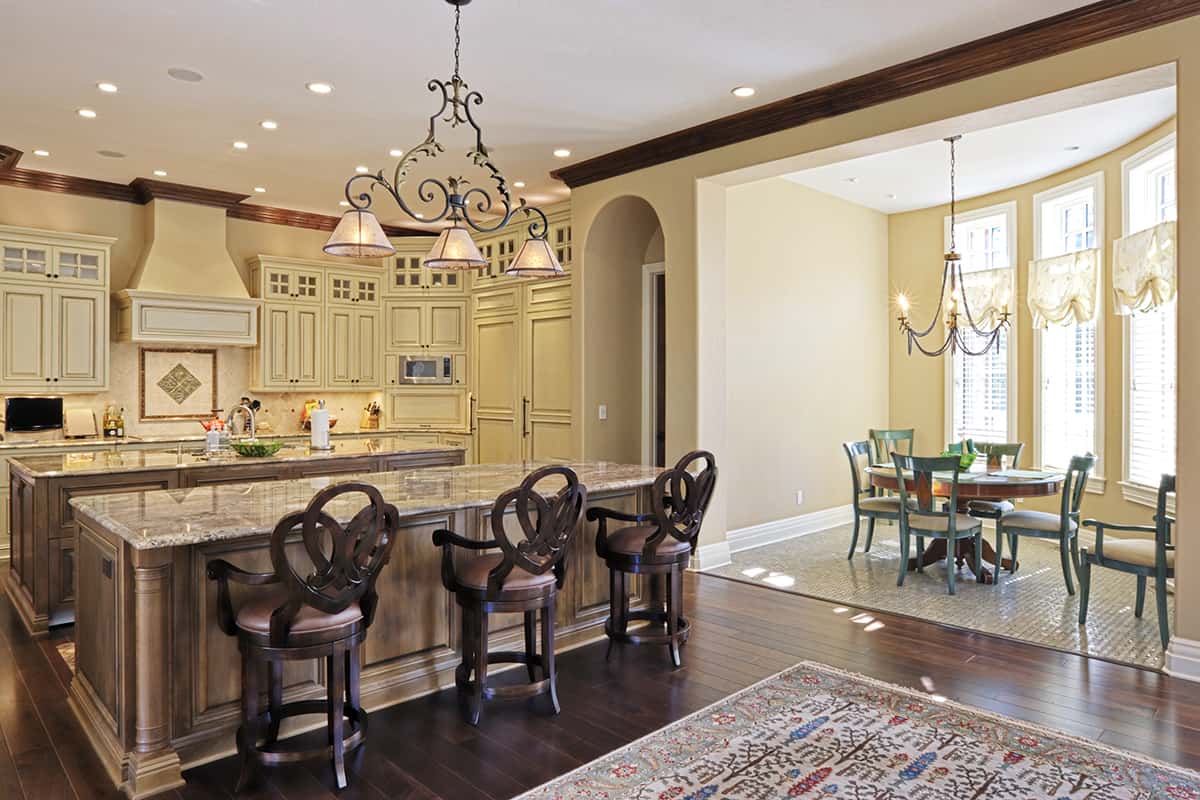 Pale Yellow Wall Go with Brown Granite Countertops