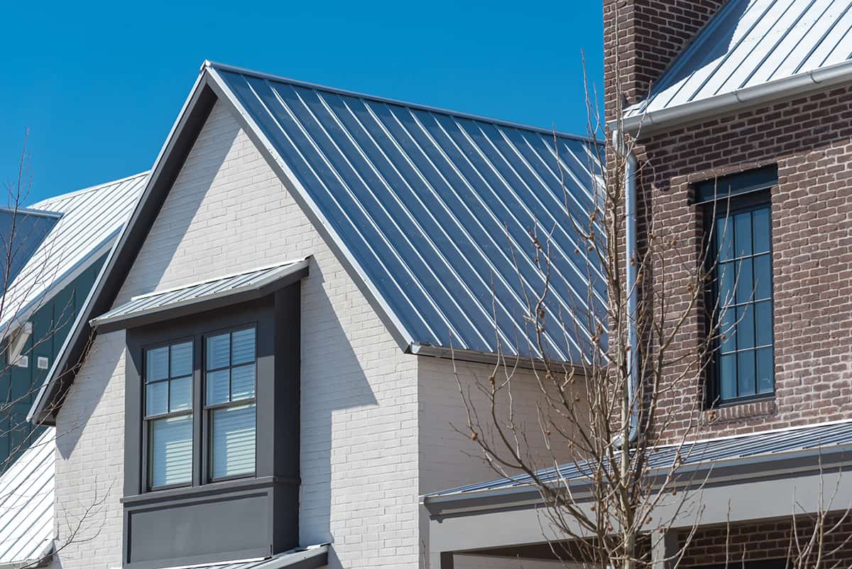 Blue Metal Roof with White Siding