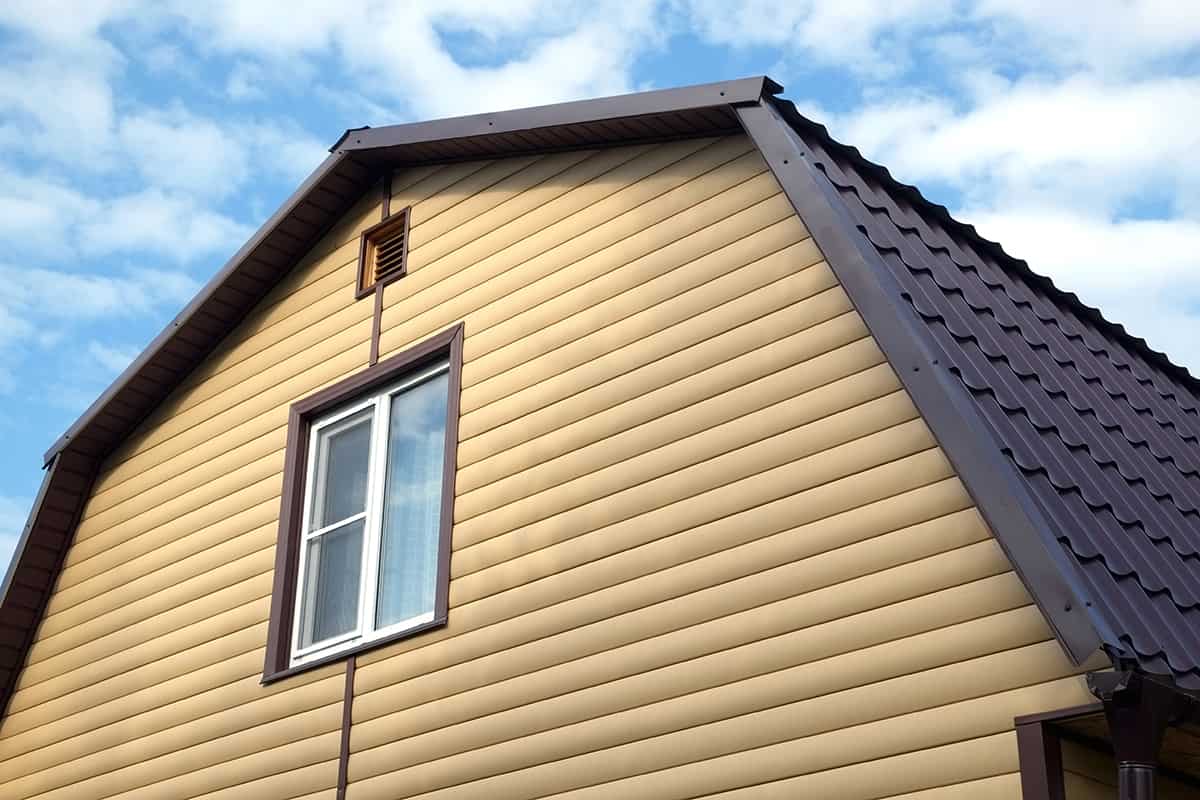 Brown Metal Roof with Earthy Siding Colors