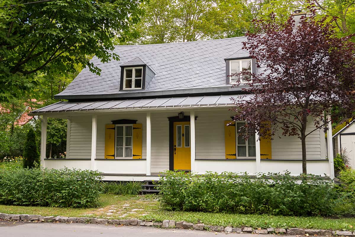 Gray Metal Roof with White Siding