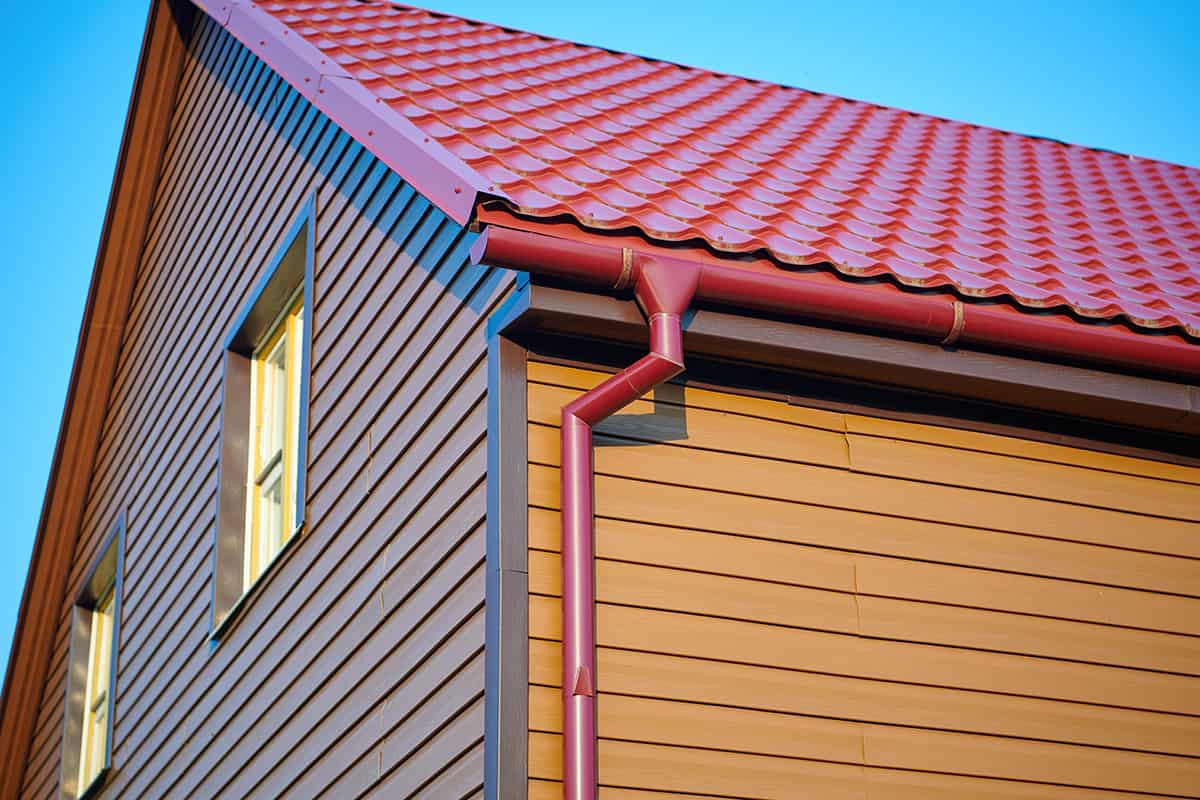 Red Metal Roof with a Contrasting Siding Color