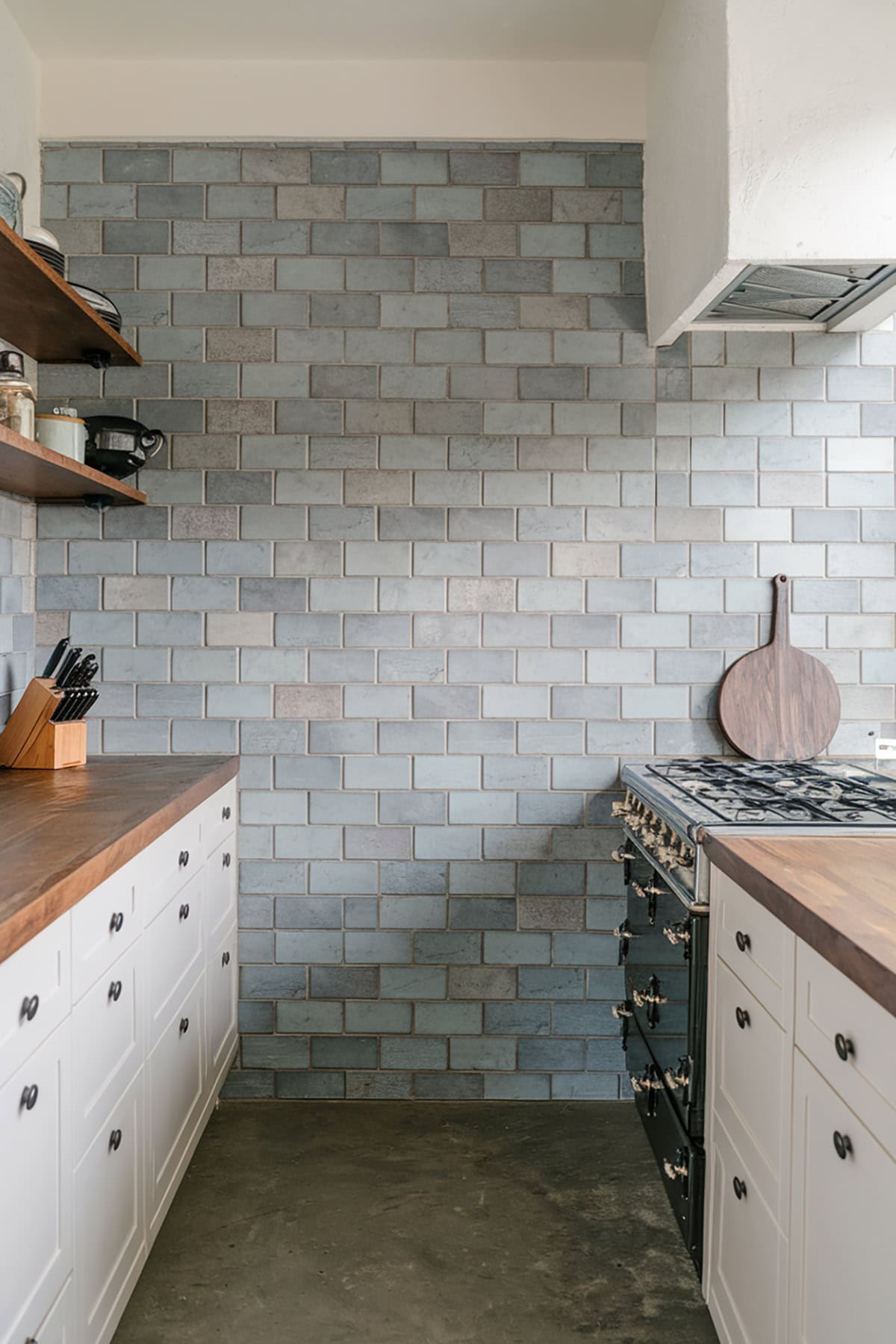 Stone or Concrete Backsplash for Subtle Texture