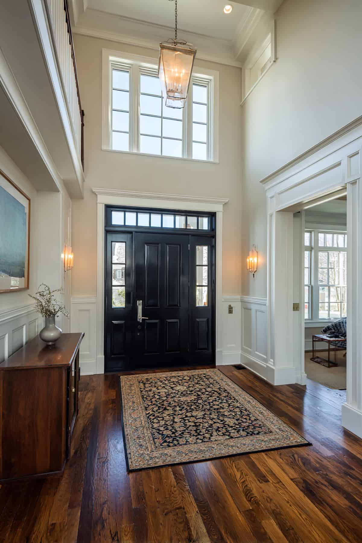Black Door with White Trim and High Ceiling Entry