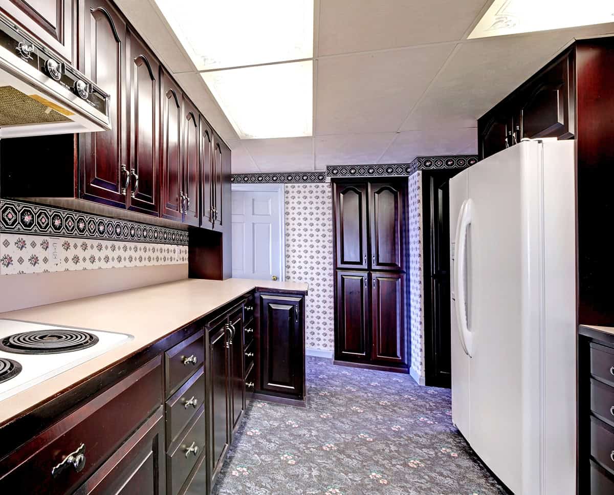 Classic Narrow Kitchen with Dark Cherry Cabinets
