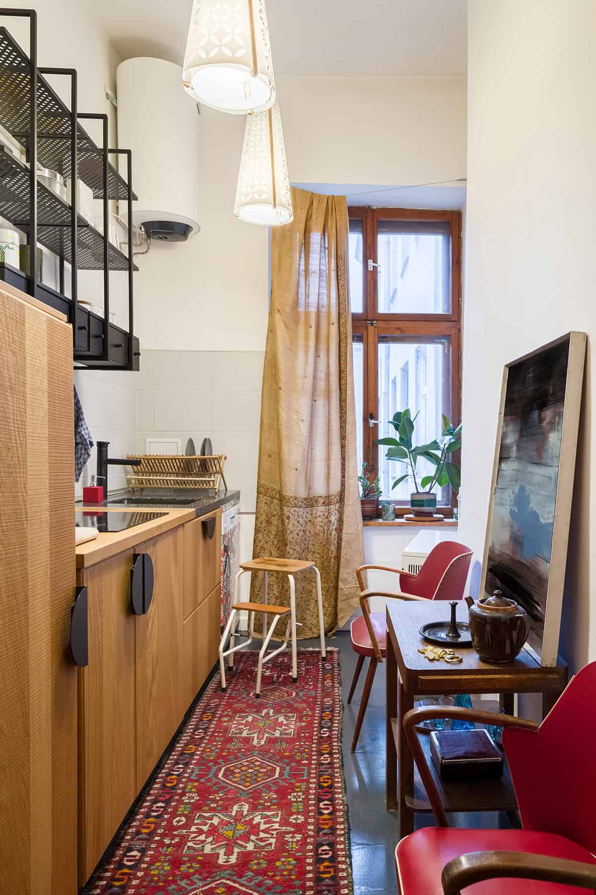 Eclectic Narrow Kitchen with Rug and Vintage Accents