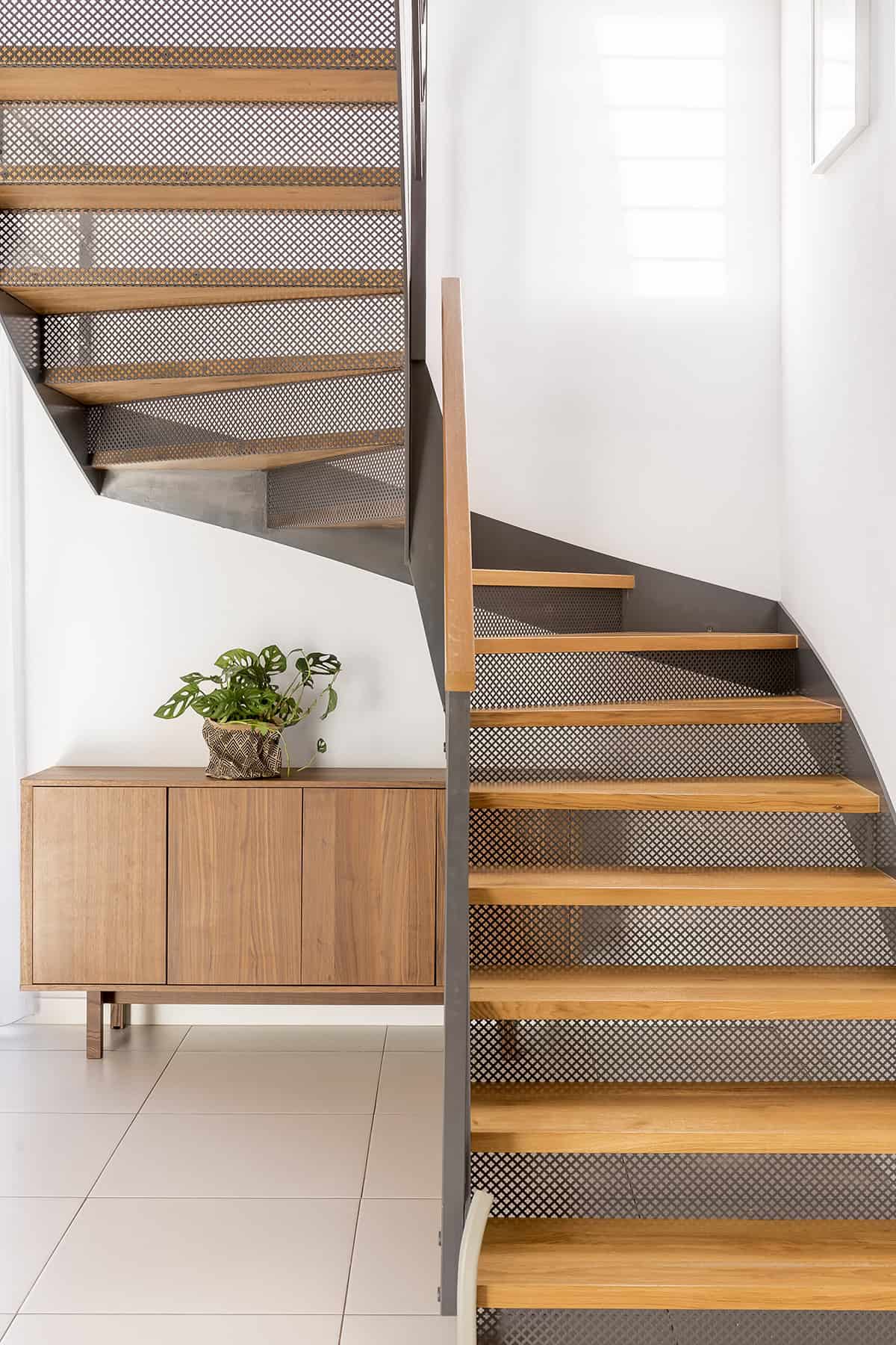 Industrial Stair Landing with Metal and Wood