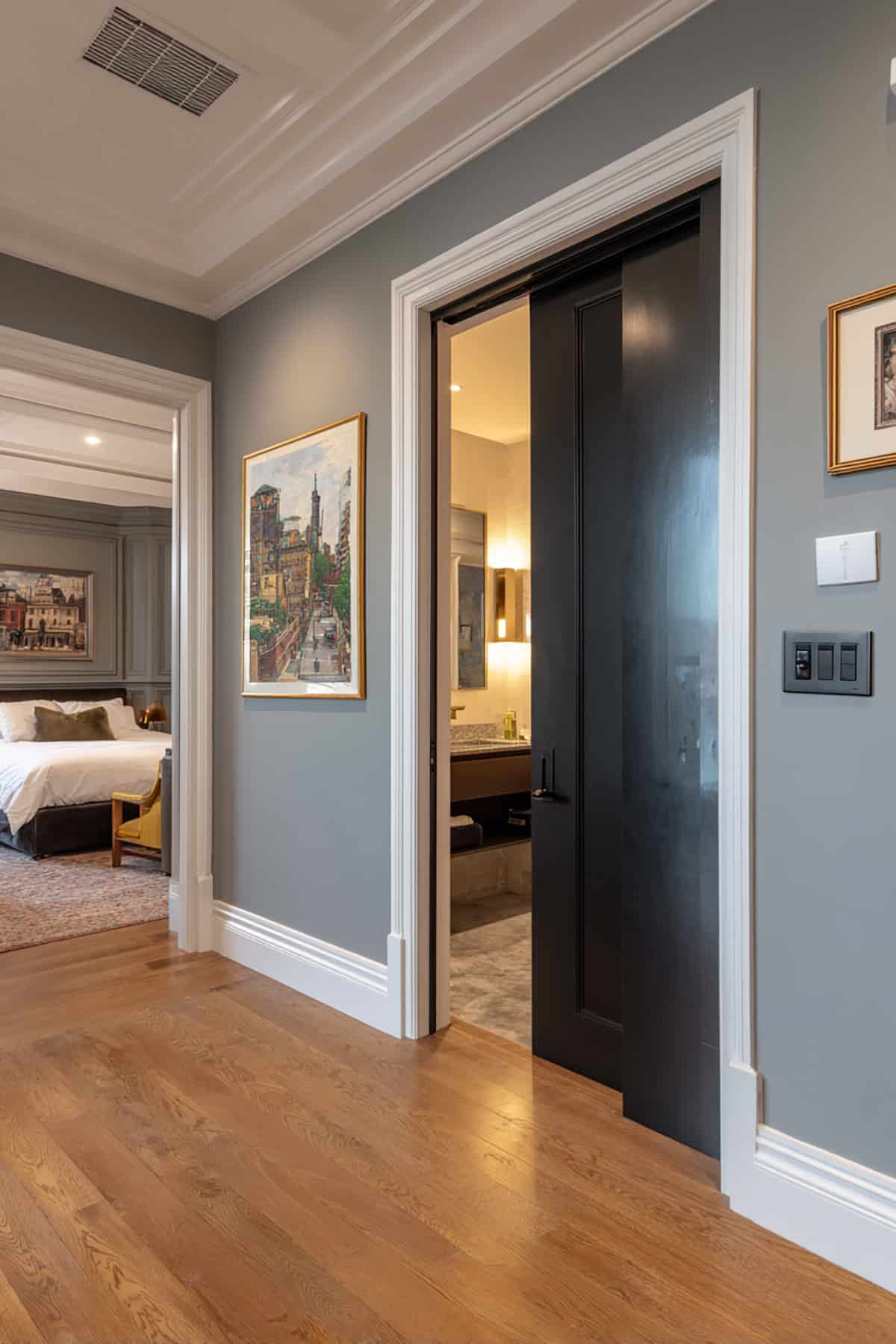 Matte Black Pocket Door with Thick White Casing