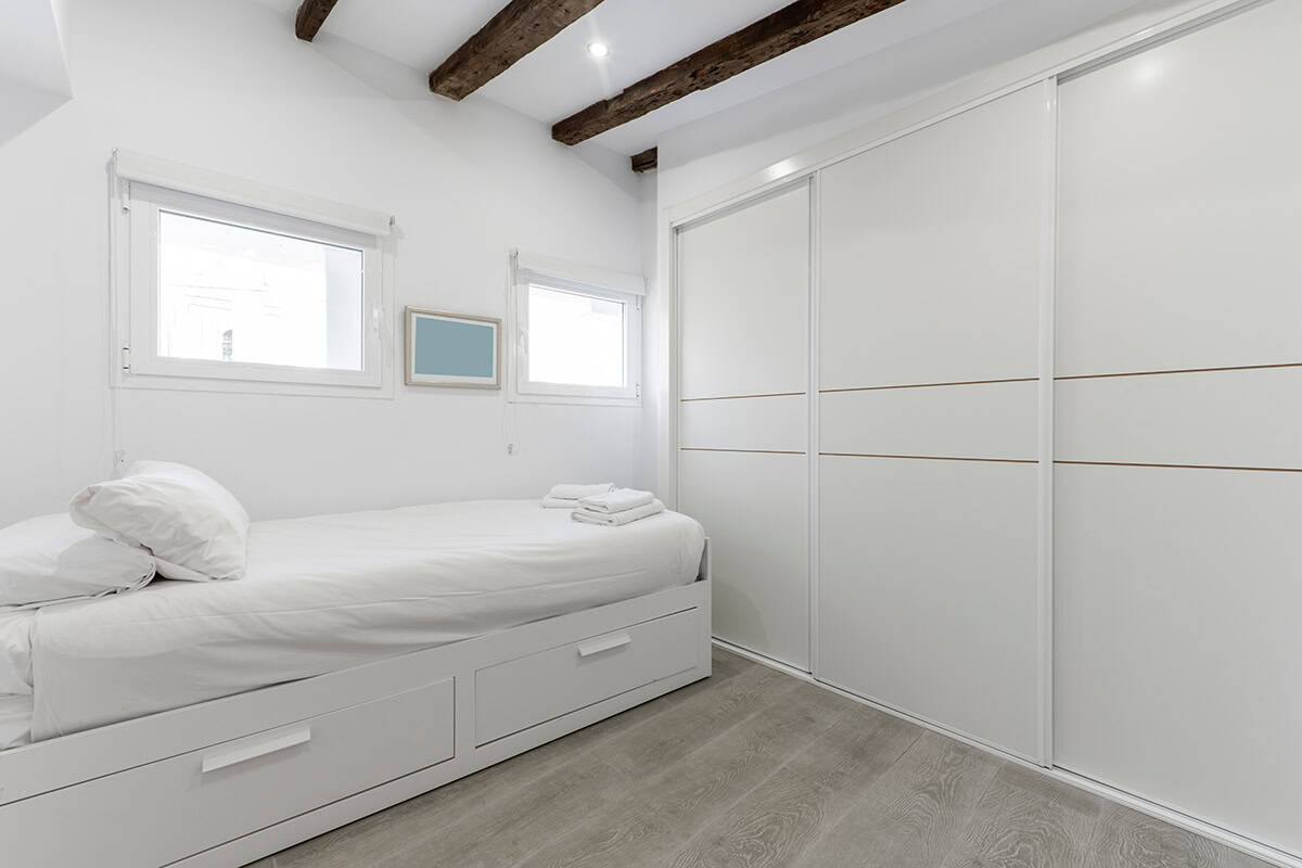 Use a Bedframe with Built in Drawers