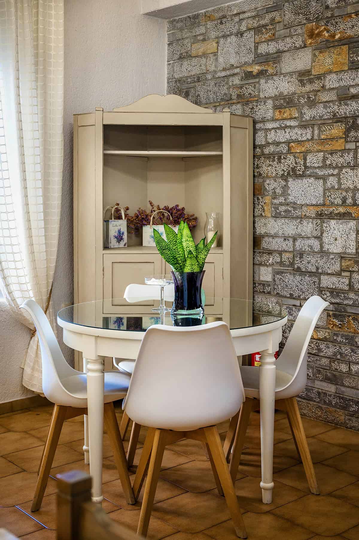 Brick Accent Wall with Cozy Dining Nook