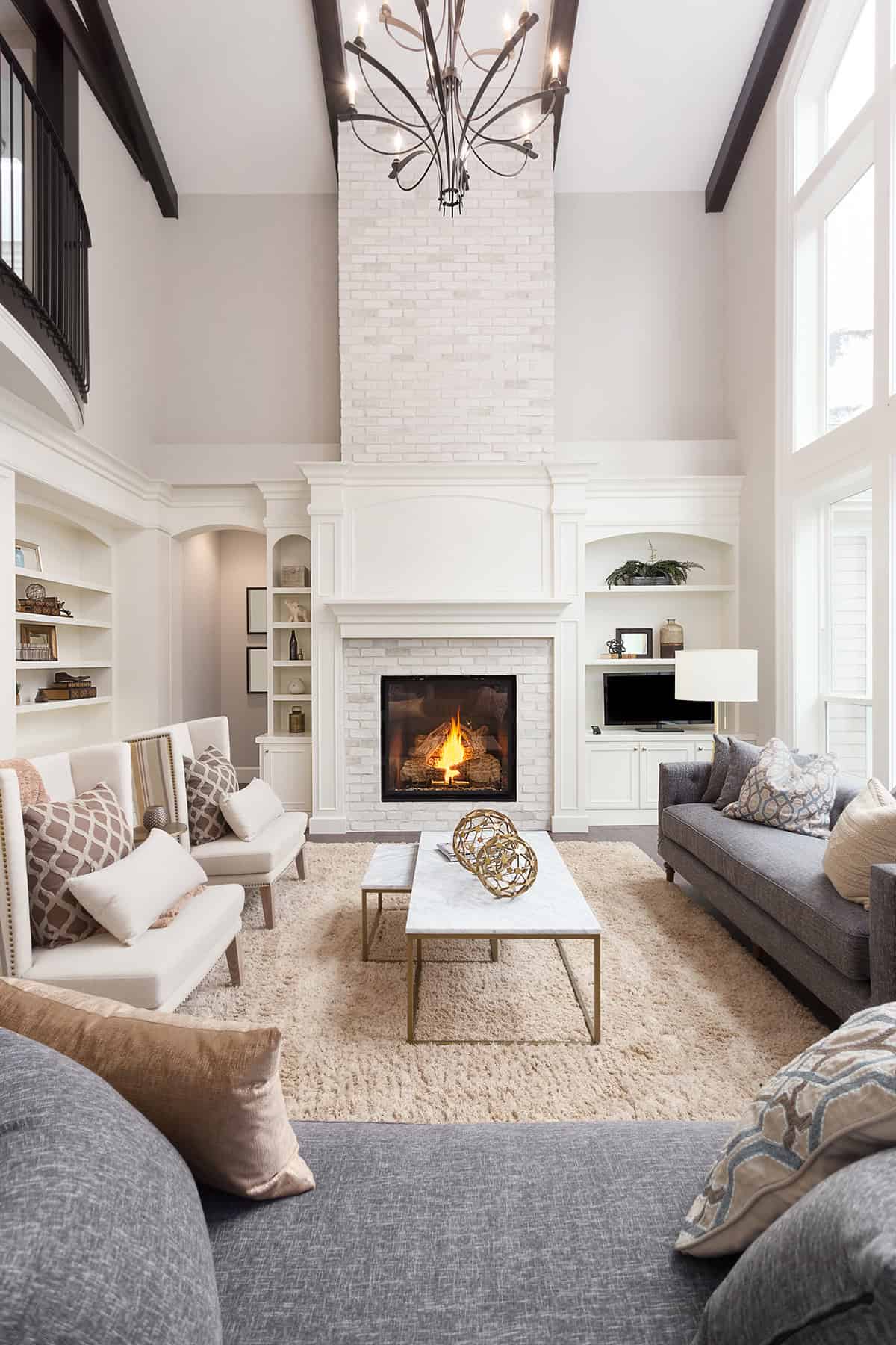 Elegant Living Room with Tall Brick Fireplace
