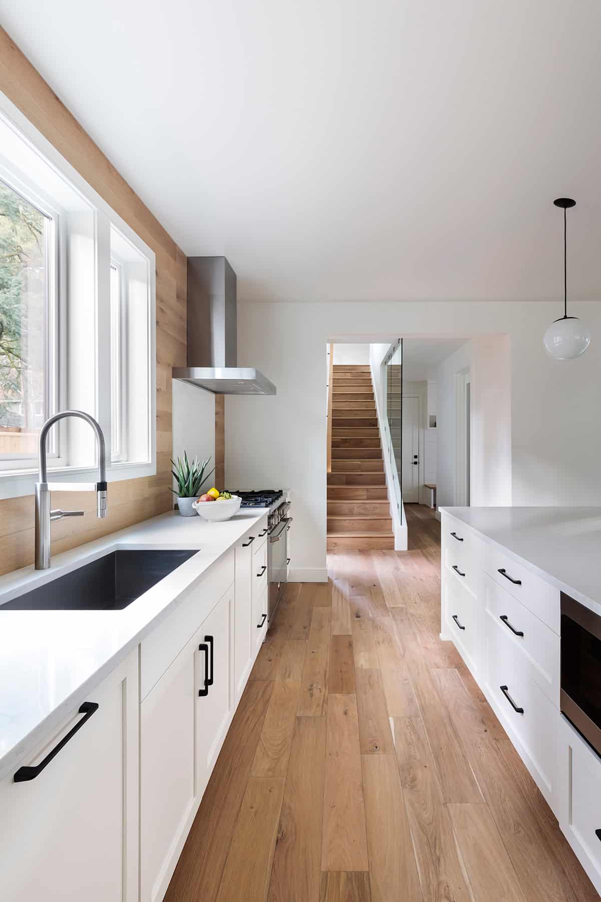Modern Galley Kitchen With Wood Flooring